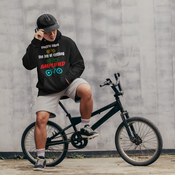 electric bikes amplified young man on bike wearing a cap